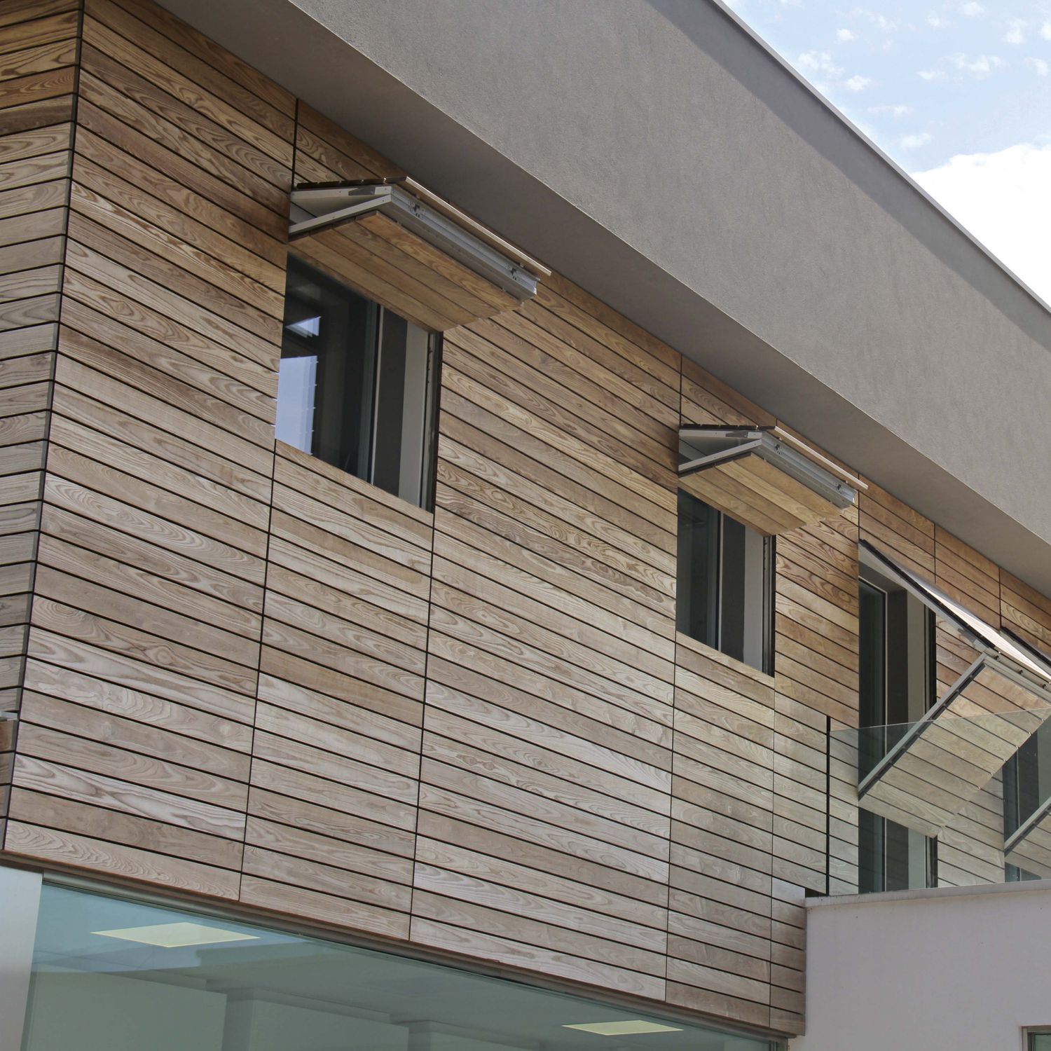 Wood wall cladding / HPL / exterior / imitation wood - IMPRONTA Wood wall cladding / HPL / exterior / imitation wood - IMPRONTA