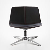 Contemporary fireside chair / fabric / leather...