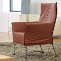 Contemporary armchair / fabric / leather...