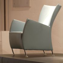 Contemporary armchair / fabric / leather...