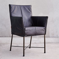 Contemporary armchair / fabric / leather...