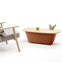 Contemporary coffee table / leather / fabric...