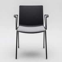 Upholstered conference chair / with armrests...
