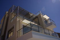 aluminium balcony with glass panels  APERTO ALUMINIUM GROUP