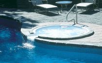 circular built-in hot-tub WHITEWAVE SPILLOVER SPA LEGACY EDITION POOLS