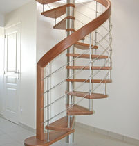 circular floating staircase in wood and steel Wendeltreppe TREPPENMEISTER