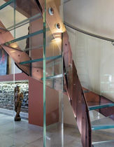 circular staircase with a lateral stringer (metal frame and glass steps) SKIN COLOR EDILCO