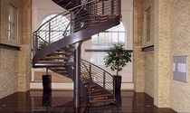 circular staircase with a lateral stringer (metal frame and wooden steps) WARE Crescent Stairs