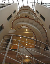 circular staircase with central stringer for commercial buildings by Fletcher Priest Hubbard