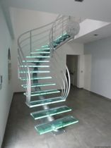 circular staircase with central stringer (metal frame and glass steps) ELCSET la stylique