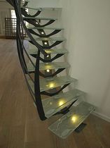circular staircase with central stringer (metal frame and glass steps) NATURA Miroiterie RIGHETTI