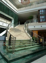 circular staircase with a lateral stringer for commercial buildings  JSM Limited
