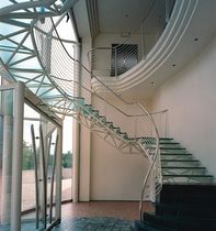 circular staircase with a lateral stringer (metal frame and glass steps) NERI LABEL ESSEMME