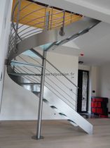 circular staircase with a lateral stringer (metal frame and glass steps)  M&eacute;tal Passion