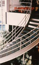 circular staircase with a lateral stringer (metal frame and steps)  STAIRWAYS inc