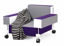 contemporary armchair with casters D 38 by Alison & Peter Smithson Tecta