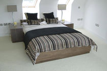 contemporary double bed with integrated bed-side table  HB Group