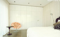 contemporary high gloss lacquered wardrobe by U. Zabers & K. Grava  Design Group IN