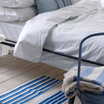 contemporary striped rug in cotton COBALT SRIPE DHURRIE DESIGNERS GUILD