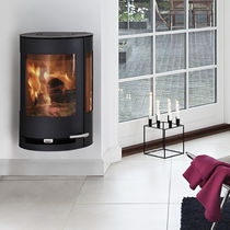 contemporary wall-mounted wood-burning stove ADURO 9-4 ADURO A/S