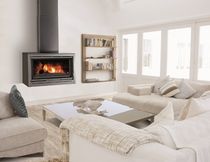 contemporary wall-mounted wood-burning stove VARIO 100 RENE BRISACH