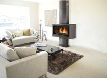contemporary wood-burning stove (steel) VARIO 100 POD RENE BRISACH