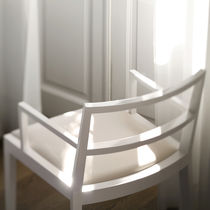 contemporary wooden chair with armrests POURPARLER by Claudio Perin TEKHNE S.r.l.