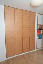 contemporary wooden wardrobe by Gatis Garvars Design Group IN