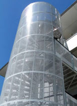 exterior spiral staircase for commercial buildings ESCALIER HELICOIDAL CAGE TOLES PERFOREES GANTOIS Industries