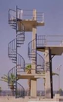 exterior spiral staircase for commercial buildings (metal frame and steps)  STAIRWAYS inc