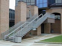 exterior straight staircase for commercial buildings  Couturier Iron Craft