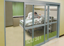 glazed fire door for commercial buildings (smoke proof) PROFILER&reg; SMOKE RATED TELESCOPING ICU/CCU Horton Automatics