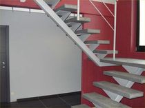 half-turn staircase with a central stringer (metal frame and wood steps)  HMS Bausysteme