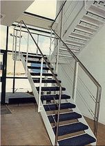 half-turn staircase with a lateral stringer  Crescent Stairs