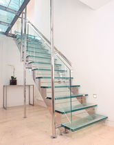 half-turn staircase with a lateral stringer (metal frame and glass steps) ENNISMORE GARDENS KD 253 SPIRAL Stairs