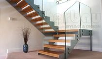 half-turn staircase with a lateral stringer (metal frame and wooden steps) MODE 500 Interbau