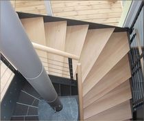 half-turn staircase with a lateral stringer (metal frame and wooden steps)  KELLER TREPPENBAU AG