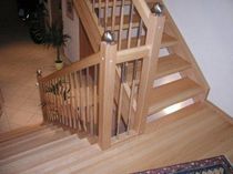 half-turn staircase with a lateral stringer (wooden frame and steps) EWT 560 Schmidt Escaliers