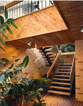 half-turn staircase with a central stringer  Couturier Iron Craft