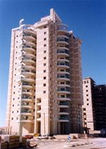natural stone facade cladding: limestone PRICE FOR BEST BUILDING 2000 GRASSI 1880