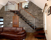 quarter-turn staircase with a central stringer (metal frame and wood steps) GERANIO E INOX - SPECIAL New Living srl