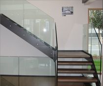 quarter-turn staircase with a lateral stringer (metal frame and wood steps)  KELLER TREPPENBAU AG