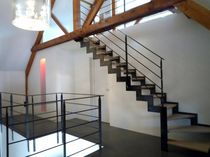 quarter-turn staircase with a lateral stringer (metal frame and wood steps) ELCR-DEF la stylique