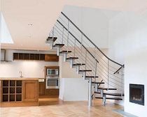 quarter-turn staircase with modular central modular stringer (metal frame and wood steps) ATRIUM SEGMENT Atrium