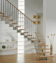 quarter-turn staircase with modular central modular stringer (metal frame and wood steps) MODULA SYSTEMA