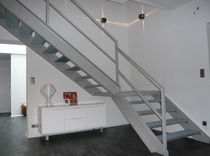 quarter-turn staircase with a lateral stringer for commercial buildings  Formadour