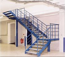 quarter-turn staircase with a lateral stringer for commercial buildings (metal frame and wooden steps)  Crescent Stairs
