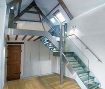 quarter-turn staircase with a lateral stringer (stainless steel frame and glass steps) RATTERY SAXUM