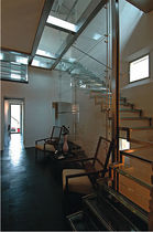 quarter-turn staircase with a lateral stringer (metal frame and glass steps) PRIVATE VILLA ESSEMME