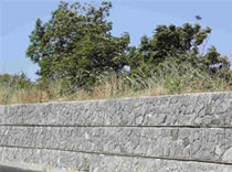 reinforced concrete retaining wall (precast units, stone finishing)  Samer S.p.A.